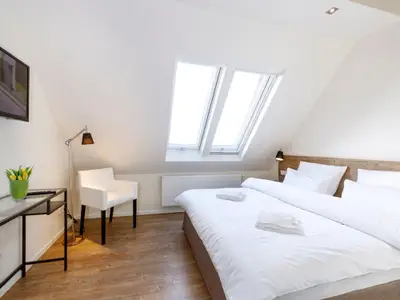 Remise- Schlafzimmer mit Dachfenster