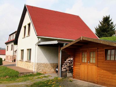 Ferienhaus mit Carport und Schuppen