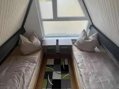 Schlafzimmer mit Einzelbetten