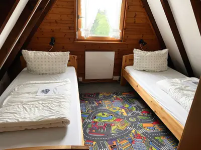 Schlafzimmer DG re - Ferienhaus-Bayern