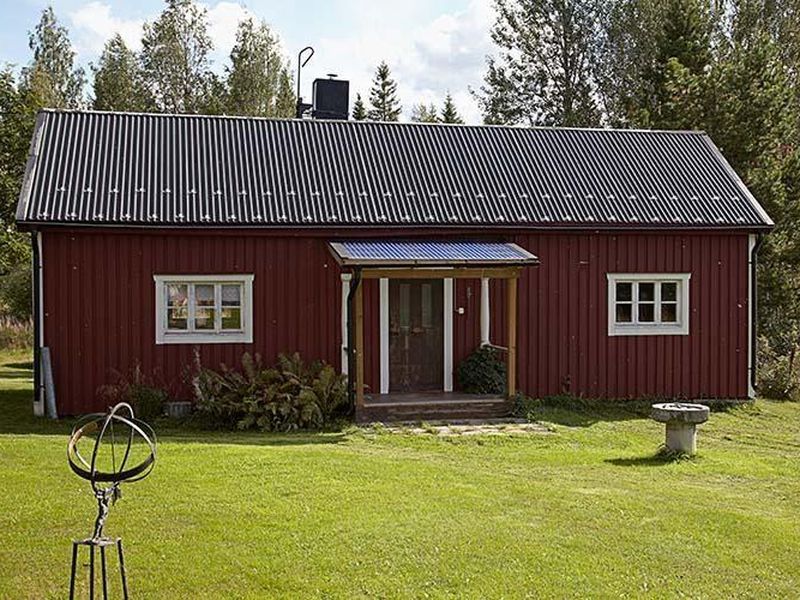 Außenansicht des Gebäudes. Das Ferienhaus im Sommer