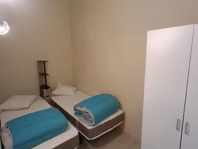 Schlafzimmer mit 3 Einzelbetten