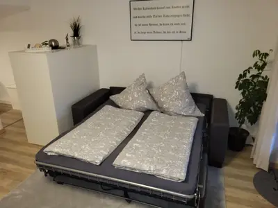 Wohnzimmer Couch ausgeklappt