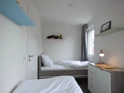 Schlafzimmer mit zwei Einzelbetten