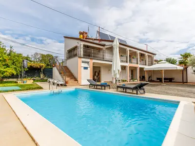 Ferienhaus für 8 Personen (150 m²) 1/10