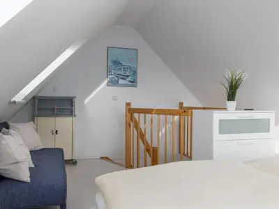 Schlafzimmer im offenen Spitzboden