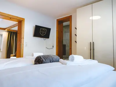 Chalet Erdgeschoss / Schlafzimmer