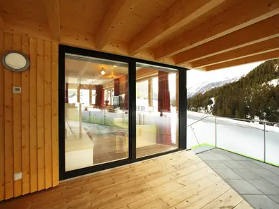 rifugio-ferienhaus-fensterfront-scaled