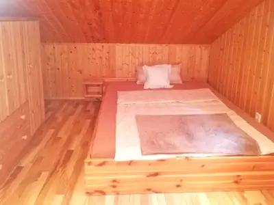 Waldhaus: Schlafzimmer im Dachgeschoss