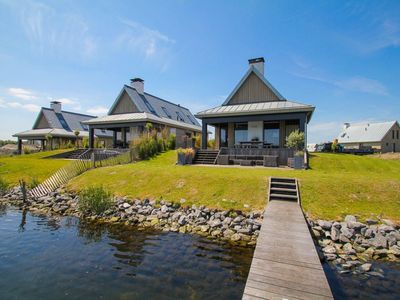 Sch&ouml;nes Ferienhaus mit Steg auf der Insel Tholen