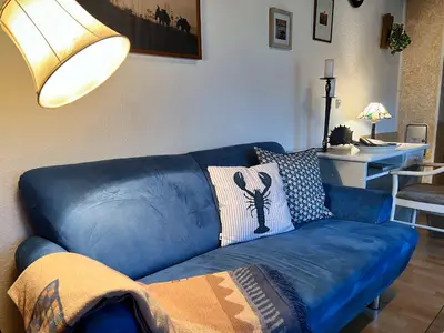 Ferienhaus Heesch Sitzecke mit Leselampe