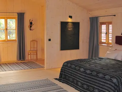 Chalet am Quittenbaum, Doppelbett im großen Schlafzimmer