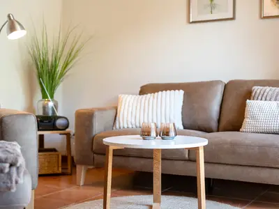 Blumenhaus Waren Wohnzimmer mit gemütlichem Sofa