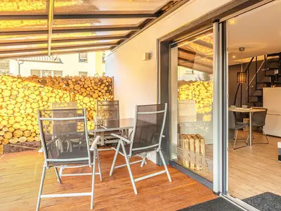 Ferienhaus Charlotta Waren (Müritz) - gr0ße Terrasse mit Grillplatz