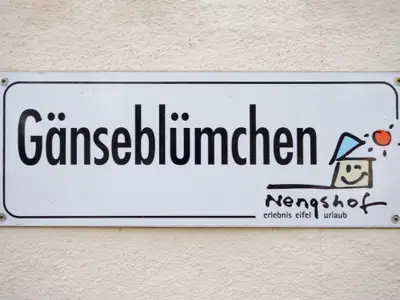 Gänseblümchen Schild am Eingang