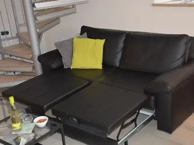 Wohnbereich. Sofa mit doppel Relaxauszug