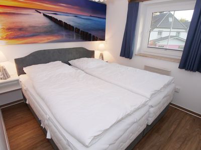 Schlafzimmer mit Doppelbett