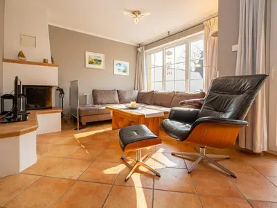 Wohnzimmer mit Kamin für gemütliche Stunden
