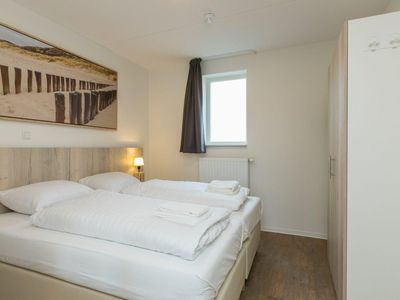 Schlafzimmer mit Doppelbett