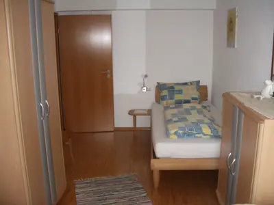 Schlafzimmer mit 3 Einzelbetten