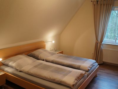 Das zweite Schlafzimmer befindet sich im 1. OG