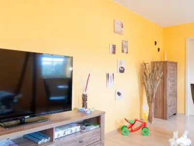 Fernseher mit Bilderwand