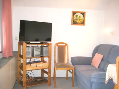 Wohn-/Schlafraum mit Sitzgruppe