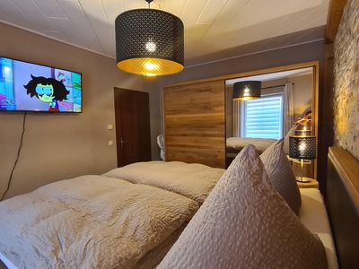 Schlafzimmer mit TV Neu