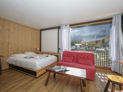 Wohnzimmer mit Doppelbett