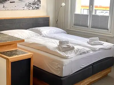 Schlafbereich mit Boxspringbett