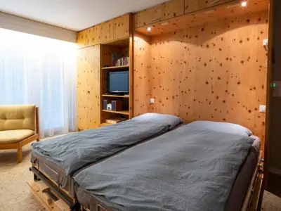 Wohnzimmer mit Schrankbett Casa Irmella 12 Arosa