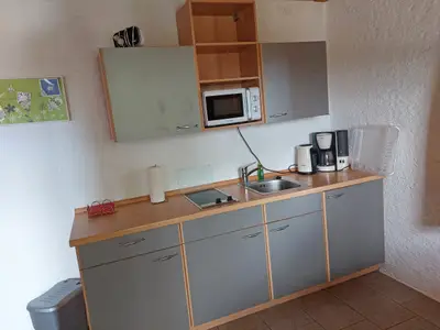 Wohnraum mit offener Küche