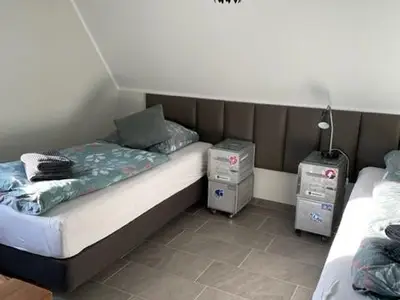 gemütliches Zweibettzimmer mit Boxspringbetten