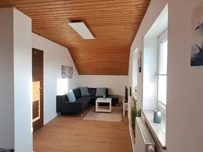 Schlafzimmer 1 mit Doppelbett und Sitzecke