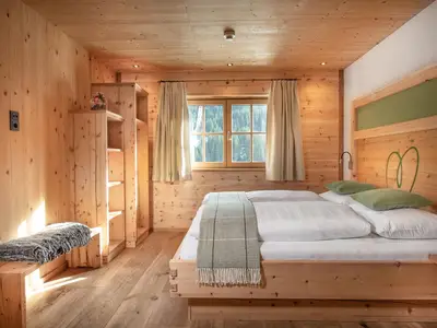 Schlafzimmer in den großen Almsuiten
