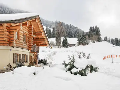 urlaub-direkt-an-der-skipiste-im-24-chalet-bad-kle