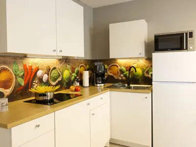 Gut ausgestattete Küche