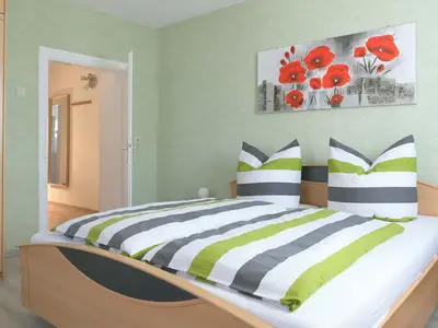 Schlafzimmer mit Platz für 3