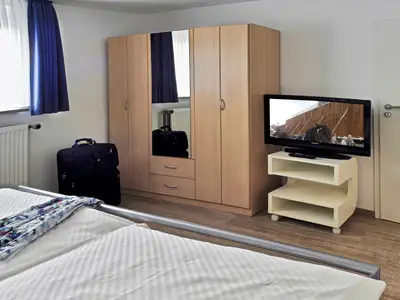 Ferienwhg.Lippold_Schlafzimmer_Fewo1