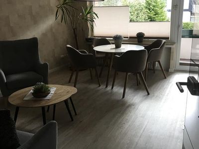 Wohnzimmer mit Balkon