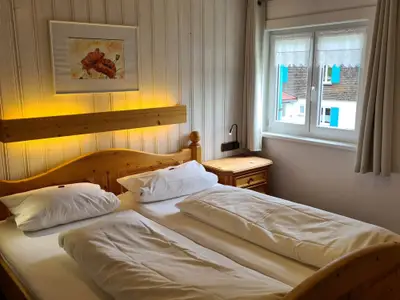 Doppelbett im Schlafzimmer Bauernhaus 4