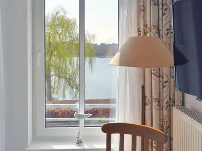 Schlafzimmer mit Sitzgelegenheit