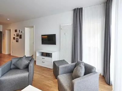 Wohnbereich mit Sitzgelegenheit, Flatscreen-TV