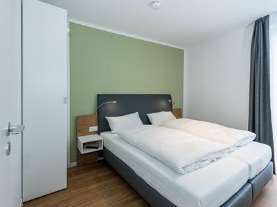 Schlafzimmer mit Doppelbett