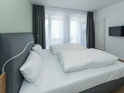 Schlafzimmer mit Doppelbett