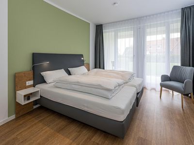 Schlafzimmer mit Doppelbett