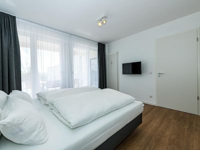 Schlafzimmer mit Doppelbett