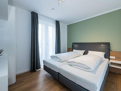 Schlafzimmer mit Doppelbett