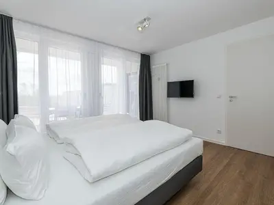 Schlafzimmer mit Doppelbett