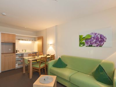 Ruhige Appartements am Wiesenhang  -  Kochnitsche Essecke mit Couch